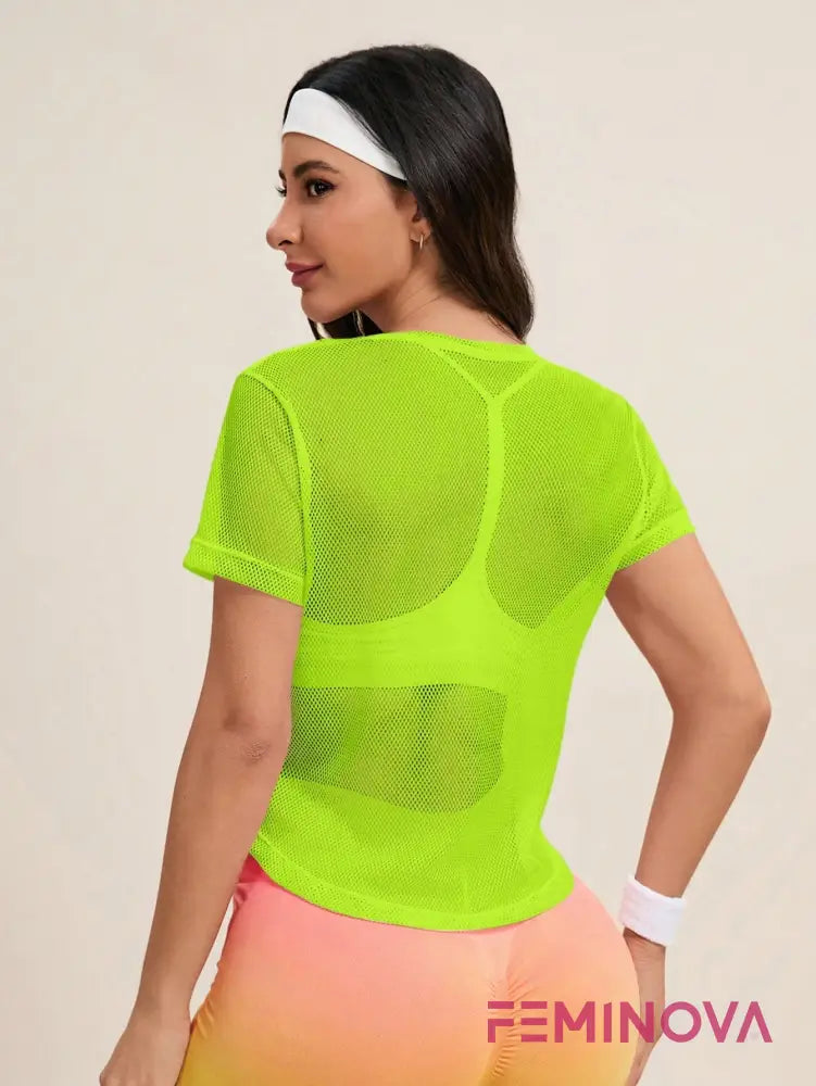 Camiseta Fitness Tela Transparente com Modelagem Soltinha